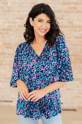 Dreamer Peplum Top in Navy and Lavender Animal Print